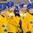 BUFFALO, NEW YORK - DECEMBER 26: Team Sweden players Linus Lindstrom #16, Jacob Moverare #27 and Elias Pettersson #14 look on during warmup prior to a game against Belarus during the preliminary round of the 2018 IIHF World Junior Championship. (Photo by Andrea Cardin/HHOF-IIHF Images)

